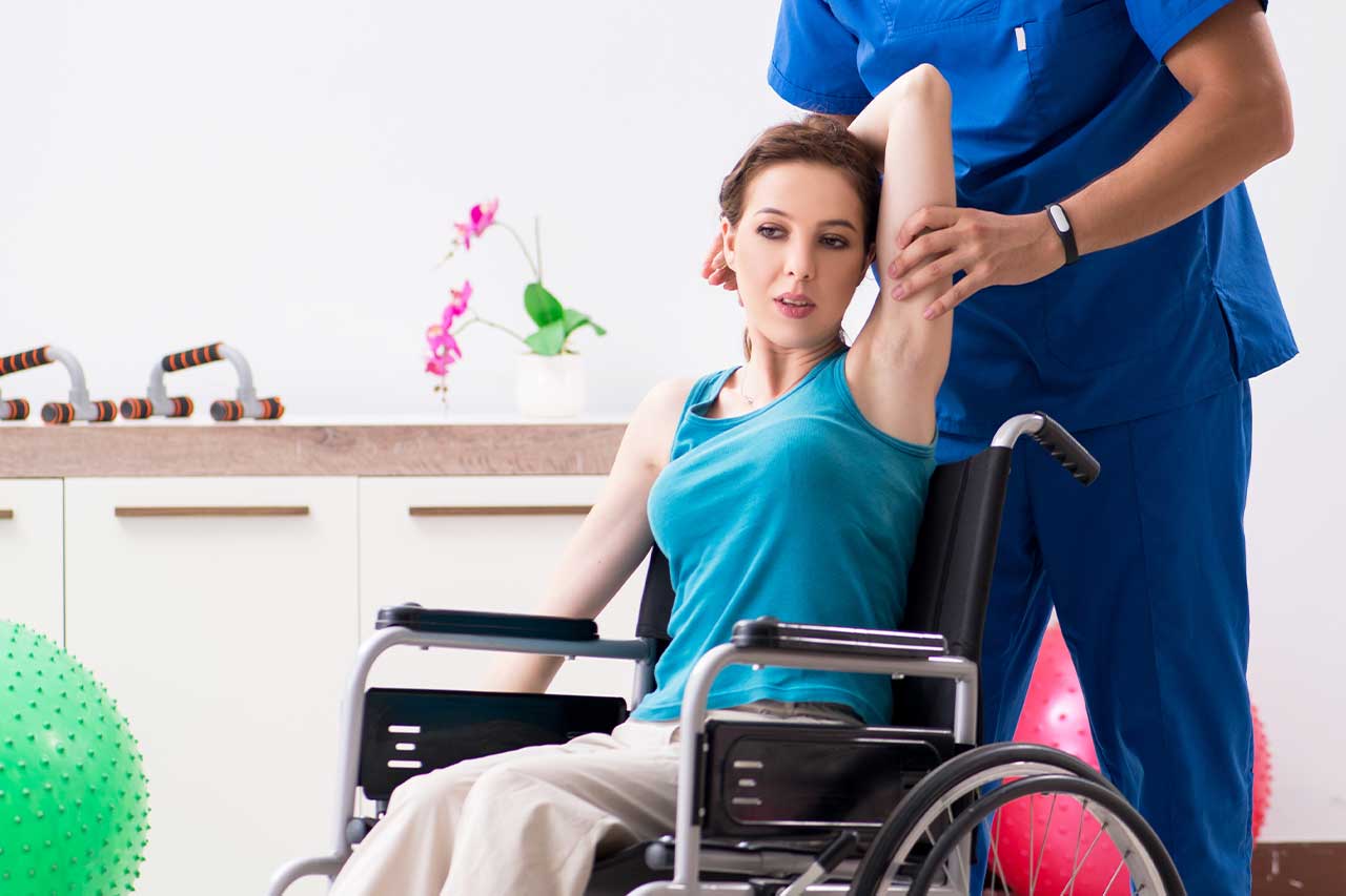 Support worker assisting with therapy at home